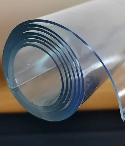 Roll of clear polycarbonate solid sheet material for large-format applications.